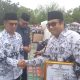 Narno,S.Kom Menerima Penghargaan dari PGRI dan Bupati Karimun GTK berprestasi Juara 2 Pelopor Komunitas Belajar Guru SMA/SMK/SLB Kepri